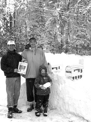 022003-2
Rochester residents Marc Manzone, Todd Kern, and his son Ethan Kern (4 years old) posed with a copy of The Wanderer in front of their home on Union Church Terrace this past Tuesday after digging out from the Blizzard of 2003. They wisely made sure to clear a path to their mailbox so they could receive this weeks issue. (Photo by and courtesy of Erin Kern). 2/20/03 edition
