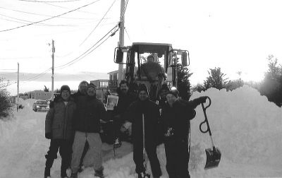 022405
In the aftermath of the recent Blizzard of 2005, several residents of the Angelica Point neighborhood (Cove Street) in Mattapoisett celebrated the much-anticipated arrival of snow removal equipment by taking a photo with a copy of The Wanderer. (Photo by and courtesy of Alison McGrath). 2/24/05 edition
