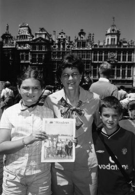 022703
Emma and Daniel Gregory posed with a copy of The Wanderer alongside their mom, Shelley Forrester, at the Grand Place of Brussels in Belgium, near where they live. The family members are summer residents of Mattapoisett and have many relatives in town and in nearby Fairhaven. (Photo by and courtesy of Doug Gregory). 2/27/03 edition
