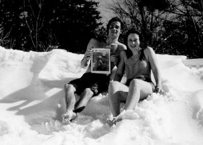 03-29-01
Ben Mechler and Christie Jones of Mattapoisett cool off after a dip in the pool at the Bethel Inn in Maine earlier this month, remembering to take along a copy of their favorite local newspaper, The Wanderer, which they posed with here in the refreshing snow. 3/29/01 edition
