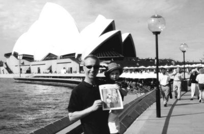 05-23-02-8
One-and-a-half-year old Marina Ingham poses with her dad, Graeme Ingham, and a copy of The Wanderer in Sydney, Australia in front of the famous citys landmark Opera House during a trip in March. 5/23/02 edition
