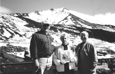 051503-2
On a recent trip to Sicily, Madelyn Fogler (center, holding a copy of The Wanderer), along with Anne and Jim Shepley, all from Mattapoisett, visited Mount Edna, going up 7,000 feet. Mount Edna is Europes largest active volcano. (Photo courtesy of Madelyn Fogler). 5/15/03 edition
