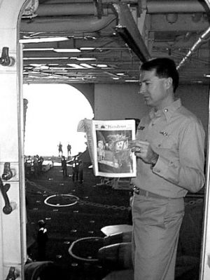 12-26-02-1
Commander Bill Hollman, US Navy Reserve, of Marion, enjoys The Wanderer during a break while at sea aboard the aircraft carrier USS Harry S. Truman (CVN 75) recently. 12/26/02 edition

