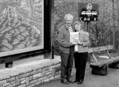 121803-1
Charlie and Pat Tate of Mattapoisett pose outside Plituice Lakes National Park in Croatia during a recent trip with a copy of The Wanderer. The couple also visited Opatija during their travels. (Photo courtesy of Charlie Tate). 12/18/03 edition
