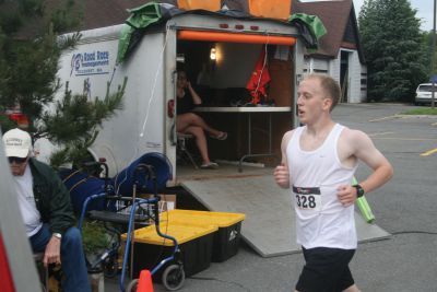 Marion Village 5K
Andy Sukeforth, a Middleboro resident and student at Bridgewater State University, was the first to cross the finish line with a time of 16:25.  Photo by Katy Fitzpatrick.
