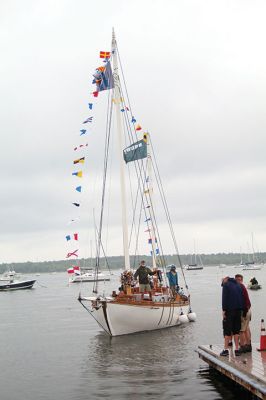 Arabella
A large crowd gathered on a rainy Saturday morning at Shipyard Park and Mattapoisett Harbor to witness the launch of “Acorn to Arabella,” a wooden sailboat made by hand in western Massachusetts. Photos by Mick Colageo. June 22, 2023 edition
