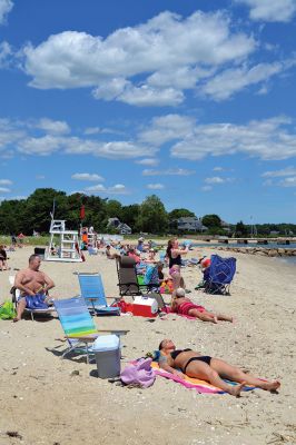Opening Day at the Beach
The reopening of Town Beach signifies the first day of summer in Marion. Dozens of beach-goers in bathing suits scattered along the beach made for a summery scene by the sea on June 21. By Jean Perry
