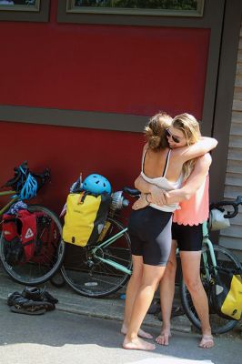 Homecoming Queens 
Colleen Oakes, originally from Marion, and Renee Buteyne, from Rochester, finished the trip of a lifetime on Monday, July 16, having ridden across the United States on their bicycles. Leaving Portland, Oregon on May 2, the two childhood friends arrived at Buteyne’s parents’ driveway about a month earlier than anticipated, greeted by family, friends, confetti, cookies, and of course, hugs. Photos by Jean Perry
