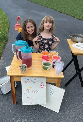 Boba-tea Stand
Emma Daniel, left, and Ruby Cambra at their boba-tea stand in Rochester, where the two children offered the drink made of tapioca pearls in a variety of flavors. This less-expensive version of the popular drink available in coffee shops was a big hit locally, and the two children, ages 8 and 7 respectively, donated the $102 they received in tips to the Fairhaven Animal Shelter. Photos courtesy of Cambra and Daniel families
