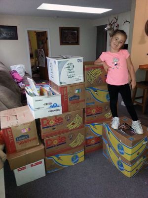 Book Collection
Six-year old Kennedy Zussy of Marion spent most of the year collecting books to establish libraries in New Bedford schools. Kennedy’s love of reading led to the donation of 1,342 books for New Bedford students. Kennedy is trying to collect another 1,000 before the summer ends. Photo courtesy of Shannon Zussy
