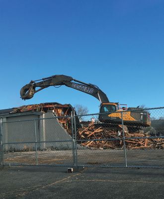 Bowlmor
Tuesday brought the end of an era, as the Bowlmor bowling alley on Route 6 in Mattapoisett village came down when Costello Dismantling demolished the long beloved venue. The structure had suffered a 2017 roof collapse, resulting in a condemnation order and eventually a demolition order for the building. See story on the Mattapoisett Board of Selectmen. Photo by Marilou Newell
