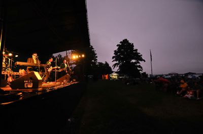 Billy Joel Tribute 
“Falling of the Rain,” may not be the biggest hit of Billy Joel produced but the Billy Joel Tribute at Silvershell beach on Saturday had no shortage of falling rain. Dozens of die hard supporters showed up despite the rain to help support the Marion Police Brotherhood and to hear the “Eric Robert: Billy Joel Tribute.” It must be true, “you can’t stop the falling of the rain!” or stop the fans. Photos by Felix Perez.
