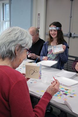 Create & Connectivity
As part of Art Week, the Marion Art Center joined the Council on Aging on Saturday morning, May 4, for a seniors and children’s “Create & Connectivity” event at the Benjamin D. Cushing Community Center. Participants of all ages used colorful paper cuts and glue to decoupage small wooden trays. Photos by Jean Perry

