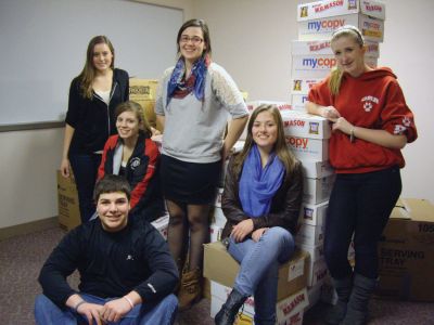 Donations for Afghanistan
Students from the Community Service Learning Council at ORRHS have finished packing 50 boxes of clothes, shoes and soccer balls for injured children. They are working to collect donations to ship the items to Afghanistan. Pictured from left to right: Tess Washburn, Madison Costa, Lauren Pettinato, Jordan Seim, Abby Duncan. Luke Mattar is seated in front. Photo courtesy of Debbie Stinson.
