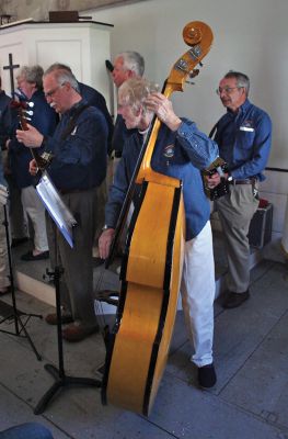 Sea Chantey
The Mattapoisett Museum and Carriage House hosted The New Bedford Sea Chantey Chorus on Sunday afternoon, April 29. The matinee concert featuring a variety of ballads, folk songs and work songs - or chanteys - was played before a full house as patrons filled the old church house to the rafters. Photo by Robert Chiarito
