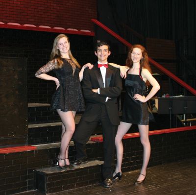Chicago Too!
The ORR Drama Club prepares for the musical "Chicago" which runs March 31 to April 2 at 7:30 pm and April 3 at 2:00 pm in the ORR High School Auditorium. Pictured from left to right: Holly Cardoza from Mattapoisett as Roxie, Ben Resendes of Rochester as Billy Flynn, and Emily Bungert of Mattapoisett as Velma. Photo by Chris Martin.
