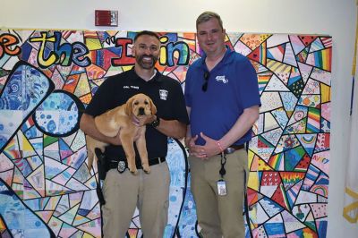 Norman the comfort dog
Norman the comfort dog has been welcomed to the Marion Police Department and Old Rochester Regional School District and MA Superintendency Union #55 by Officer Tracy, Superintendent Michael S. Nelson and Chief Richard Nighelli. Photos courtesy Boonefield Labradors, Marion Police Department and ORR District

