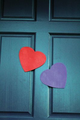Hearts for Hannah 
After Tabor graduate and Marion native Hannah Strom was seriously injured in a motor vehicle accident in Florida last week while traveling with the Holy Cross Women’s Rowing team, her community back home is showing its support by displaying red and purple hearts on the doors and windows of homes, buildings, and village businesses. These two hearts hung on the door of the Marion Art Center are only two of many popping up all over Marion as a way to show support for Strom and her family 
