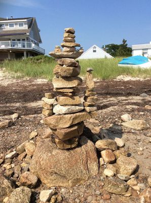 Crescent Beach
An artist staying at Crescent Beach recently constructed a number of cairns on the beach near Waterman Street and on the rocks between Goat Island and Strawberry Point visible from the end of Island Street Photo courtesy Bev Gleason
