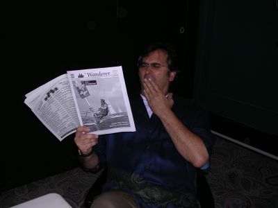 Bruce Campbell
Groovy! Yep, cult B-movie actor Bruce Campbell was in Boston this past week to promote the release of his new novel How to Make Love the Bruce Campbell Way and to premiere The Man With the Screaming Brain, his feature film directorial debut in which he also stars. Here he took time to pose with a copy of The Wanderer ... a publication a little less creepy than that dreaded Book of the Dead he keeps digging up. (Photo by Kenneth J. Souza).
Keywords: Bruce Campbell
