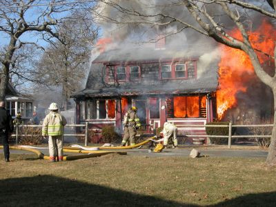 Fatal Fire
A devastating house fire at 13 Briar Road in the Point Connett area of Mattapoisett claimed the life of the sole occupant, 72-year-old Carlton Cook, on Sunday afternoon, February 3. (Photo by Paul Lopes).
