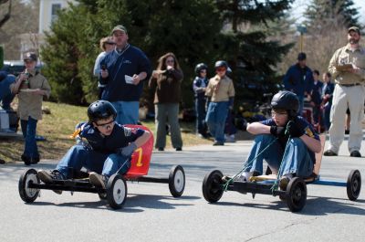 Ready, Set, Go!
On Sunday, March 21, 2010 The Marion Cub Scouts Pack 32 revived the annual soap-box derby after a three-year absence. Scouts raced carts down Holmes Street in Marion for a chance to help make their den the fastest in the pack. After several races and dozens of trips up and down the hill, the Webelos II Den went home with the title. Photos by Felix Perez.
