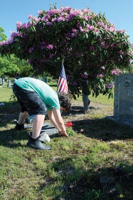 Marion Memorial Day
Jack LeFavor of Marion prepares a spot at one gravesite while James Whipple of Mattapoisett applies the finishing touches at another, as the two eight-year-old members of Marion Cub Scout Pack 32 help the Marion Department of Public Works plant flowers at all veterans’ graves in the Evergreen Cemetery on Saturday morning. The tradition, explained DPW representative Jody Dickerson, goes back to the Civil War. Evergreen is the largest of Marion’s five cemeteries. Photos by Mick Colageo
