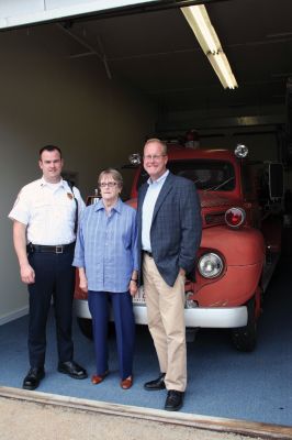 Historic Engine
The Dunn family of Mattapoisett is donating their iconic Maxim Motors Company 1949 fire engine to the Mattapoisett Rescue Association as of October 2011. From left to right: Mattapoisett Fire Chief Andrew Murray, Gail Dunn and David Dunn. The engine will remain at its current location at 55 County Road, Mattapoisett. Photo by Anne Kakley.
