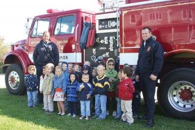 Fire Prevention
Chief Andrew Murray and Lieutenant Saltmarsh of the Mattapoisett Fire Department visited the Mattapoisett YMCA's Shining Tides Preschool during Fire Safety Prevention Week. There will be a Fire Department open house on Thursday, October 13 from 6:00 to 8:00 at the Mattapoisett Fire Station on Route 6. Photo courtesy of Tricia Weaver.
