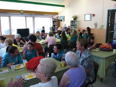 Senior Tea Party
The Junior Girl Scout Troop #85112 hosted the 6th annual Senior Tea Party at Village Court in Mattapoisett on May 23rd.  The seniors and Girl Scouts had a great time.  After the girls visited with the guests, they sang a few songs and played a few songs on their instruments.  Photo courtesy Heather Bichsel
