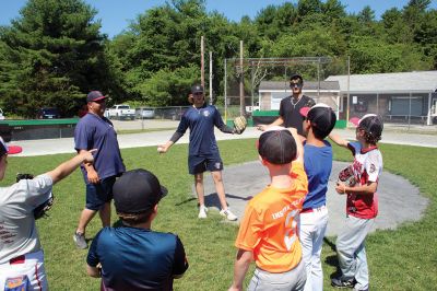 Wareham Gatemen
Wareham Gatemen, who visited with Old Rochester Youth Baseball and conducted a clinic on Saturday morning at Gifford Park in Rochester. The Cape Cod Baseball League team worked with Tri-Town players on hitting, fielding, base running and T-ball. Action photos by Mick Colageo, group photo courtesy of ORYB

