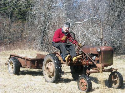 Signs of Spring
Wanderer reader Liz Glennon-Hathaway knows that its springtime when she sees George Church out in his Rochester field with his tractor, which she says are both going strong. Here, Mr. Church starts his yardwork on March 18, 2010. Photo by Liz Glennon-Hathaway.
