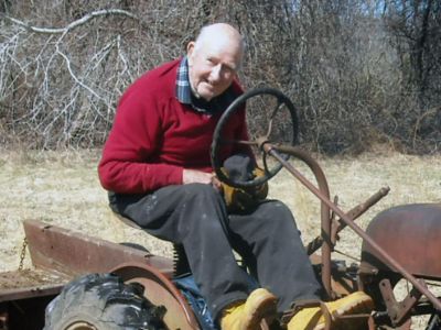 Signs of Spring
Wanderer reader Liz Glennon-Hathaway knows that its springtime when she sees George Church out in his Rochester field with his tractor, which she says are both going strong. Here, Mr. Church starts his yardwork on March 18, 2010. Photo by Liz Glennon-Hathaway.
