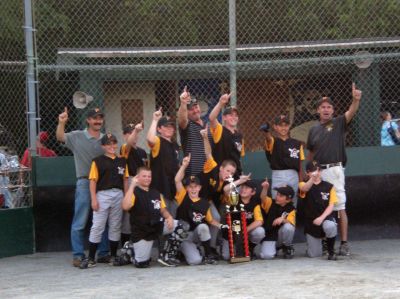 Pirates Prevail
Rochester Pirates sailed to victory by winning the 2009 Rochester Little League Championship. Front row, left to right: Tucker Mendonca, Stephen Burke, Sam Kirby, Sean Hopkins, Jake Thompson, Nate Cobis. Back row, left to right: Coach Rod McCollester, Luke McCollester, Cameron Stuart, Riley Sherman, Coach Gary Sherman, Jeremy Bare, Hunter Foley, Coach/Manager George Kirby. Photo by Lynne Foley.
