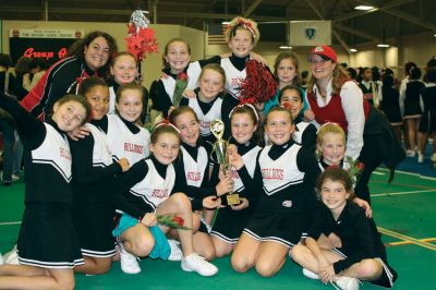 Top Cheer
On Saturday, November 14, 2009, the Junior PeeWee Cheerleaders aged 9-11 from Old Rochester Youth Football (ORYF) competed in the New England Cheer and Dance Competition in Boston. The girls, coached by Patti McArdle and Cheryl Sweeney, won first place in their group and were also awarded the Grand Champion Trophy for the youth division. The cheerleaders are all from Mattapoisett, Marion or Rochester. 
