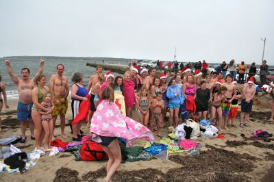 Christmas Day Swim
Helping Hands and Hooves hosted their 11th annual Christmas Day Swim at 11:00 am at the Mattapoisett Town Beach. Helping Hands and Hooves is a non-profit (based in Mattapoisett) that is dedicated to providing therapeutic horseback riding lessons for adults with disabilities. If you would like to learn more about Helping Hands and Hooves you can visit their website at www.helpinghandsandhooves.org. Photo by Robert Chiarito
