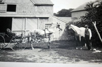 Mattapoisett Historical Museum Photos
The Mattapoisett Historical Museum is in possession of hundreds of photographs dating from the 1800s to as recently as the 1980s bearing images of people and places from Mattapoisett, but lacking identification. In their latest exhibit, the museum is asking the public to help solve the mystery each of the pictures represents. Each black and white or colorized image is a mini-mystery waiting to be solved. Photos (of the photos) by Marilou Newell
