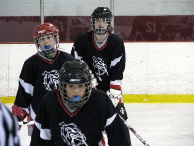 Jr. Bulldogs Hockey
(Front to back) Halle Silva, Chase Correia, and Zack Mathews await a key face off for the Jr. Bulldogs.
