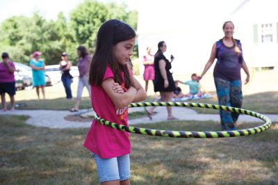 Hula Hooping
On Saturday, July 23, kids at the Plumb Library in Rochester tried a little hula hooping with Pinto Bella. The event is part of the library’s summer reading theme of health and wellness. Photos by Colin Veitch
