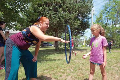 Hula-hoop Performer
Hula-hoop performer Pinto Bella taught kids the benefit of hula-hooping for body and mind and performed superhero-themed tricks on June 20 at Plumb Library. Photos by Colin Veitch
