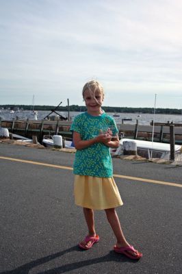 Fish Story
The Buzzards Bay Anglers Club hosted the First Annual Gus Casassa Scup Cup fishing tournament at the Mattapoisett Wharves on Saturday, July 11. The event attracted about 20 youngsters aged twelve and younger with each child receiving a new fishing rod and reel as part of their entry. Winners, who caught the largest fish of the day, also were awarded plaques for their efforts. Photo by Robert Chiarito.
