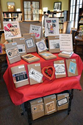 Blind Date with a Book
The Mattapoisett Library had a whole day of programs and activities in honor of Valentine’s Day. If you were looking for a new literary lover without all the hassle, the library set up a “Blind Date with a Book” display, where new books of all genres were wrapped up like secrets, waiting to be opened and cuddled up with over the long weekend.   Photo by Jean Perry
