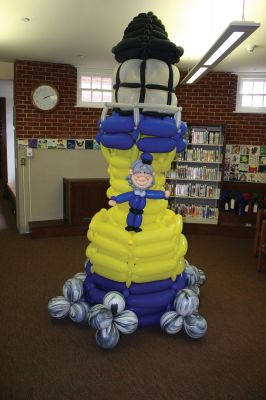Balloon Lighthouse
A 7 foot tall lighthouse comprised entirely of balloons is on display in the children’s room at the Mattapoisett Free Public Library. Photo by Katy Fitzpatrick
