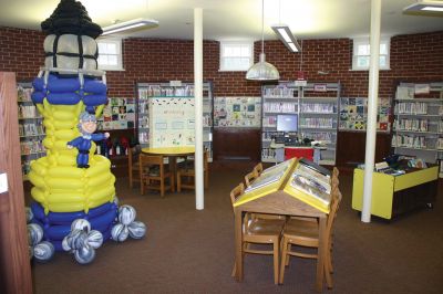 Balloon Lighthouse
A 7 foot tall lighthouse comprised entirely of balloons is on display in the children’s room at the Mattapoisett Free Public Library. Photo by Katy Fitzpatrick
