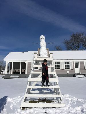 Lifeguard
Bobby Calder poses with the new lifeguard at the Mattapoisett Beach on February 6. Photo by Sarah Calder
