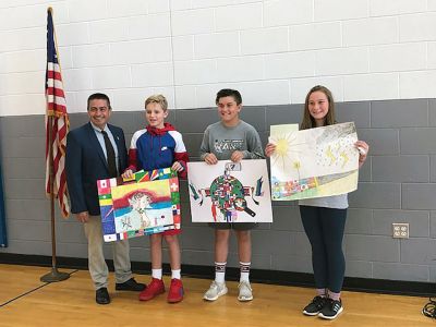 Mattapoisett Lions Club  Peace Poster Contest.
The Mattapoisett Lions Club has announced its winners of the Peace Poster Contest. Pictured here L-R: President of the Mattapoisett Lions Club Mario Conde, second place winner Luke Oliveira, first place winner Owen Callahan, and third place winner Carolyn Melo. Each of the top three winners received Barnes and Noble gift cards. Photo courtesy Helene Rose
