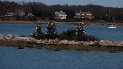 Little Island
Christmas lights glimmer on the water in the middle of Sippican Harbor for the first time. Jay Wurts, owner of Little Island, and his partner Catherine Lacause decorated the trees on the small half-acre island for Christmas, using a solar cell battery to power 1,000 LED lights. Photo submitted by Catherine Lacause
