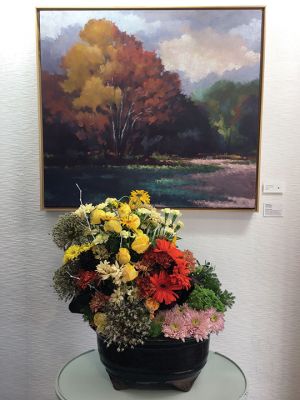 Art in Bloom Show
The Marion Art Center’s Art in Bloom Show opened on June 24. This year’s highlighted artist is the late Willoughby Elliott, whose landscapes and still lives were the inspiration for many exciting and uniquely realized floral arrangements. MAC members Kim Barry, Nicole Arsenault, Suzie Kokkins, Donna Paulding, Vicki Hurcombe, Joan Gardner, Michelle Russell, Karilon Grainger, Bunny Mogilnicki, Connie Dolan, Heather Parsons, Veronique Bale, Lisa Larkin, Ashley Briggs, and Virginia Boone displayed their creativ
