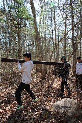 Mattapoisett Land Trust
Tabor Academy students and faculty volunteered to help clear a walking path on a 14-acre property bought last year by the Mattapoisett Land Trust. Photos by Mick Colageo
