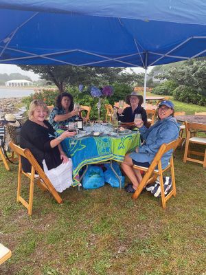 Great Community Picnic
One table of four persisted despite thunder and rain spoiling the August 5 Great Community Picnic, a main fundraiser for the Mattapoisett Land Trust that is annually scheduled at Munro Reserve, The Long Wharf. The folks are Gail Carlson, Mary Lou Manley, Ann Danforth, and Joe Dinos, all of Mattapoisett. Hearty New Englanders! Photos by Mike Huguenin, MLT
